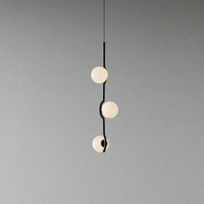 Globe pendant light featuring a modern white glass shade and sleek metal design, adjustable height for kitchen island or dining room illumination. 14