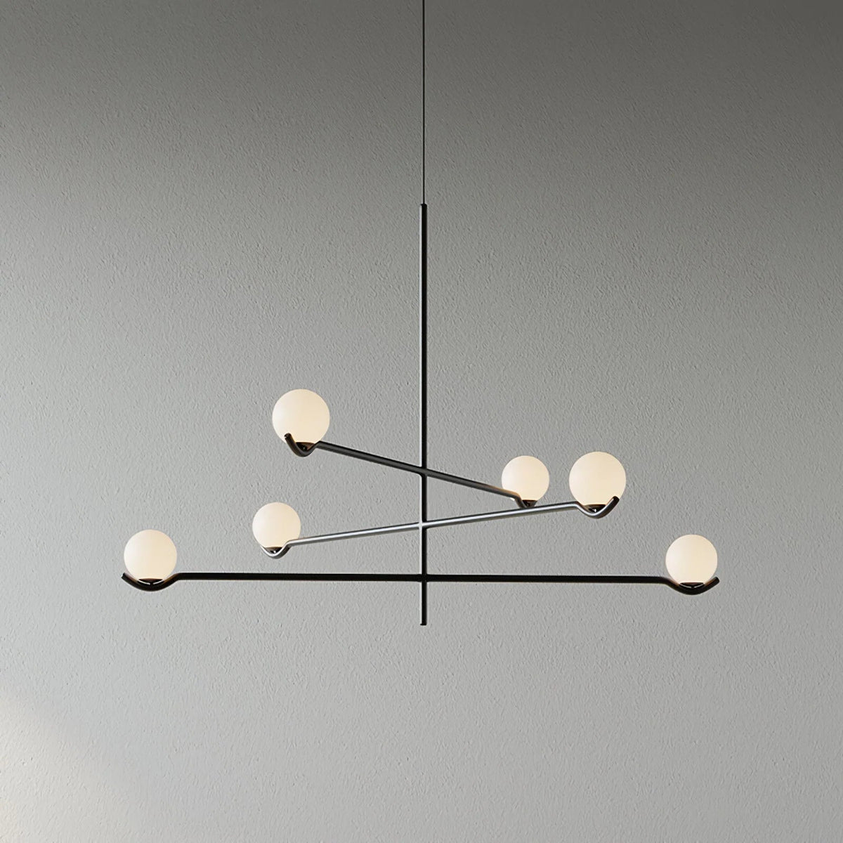 Globe pendant light featuring a modern white glass shade and sleek metal design, adjustable height for kitchen island or dining room illumination. 11
