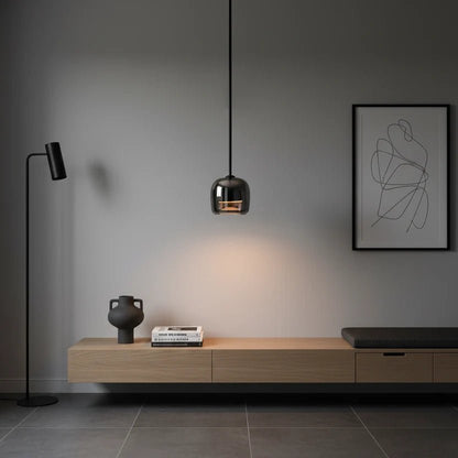 Modern globe pendant light featuring a smoky glass shade and sleek black metal finish, perfect for stylish kitchen lighting with integrated LED technology. 2