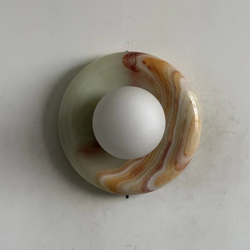 Globe Wall Light featuring a natural onyx backplate, designed as a compact ambient sconce for modern interior decor. 21