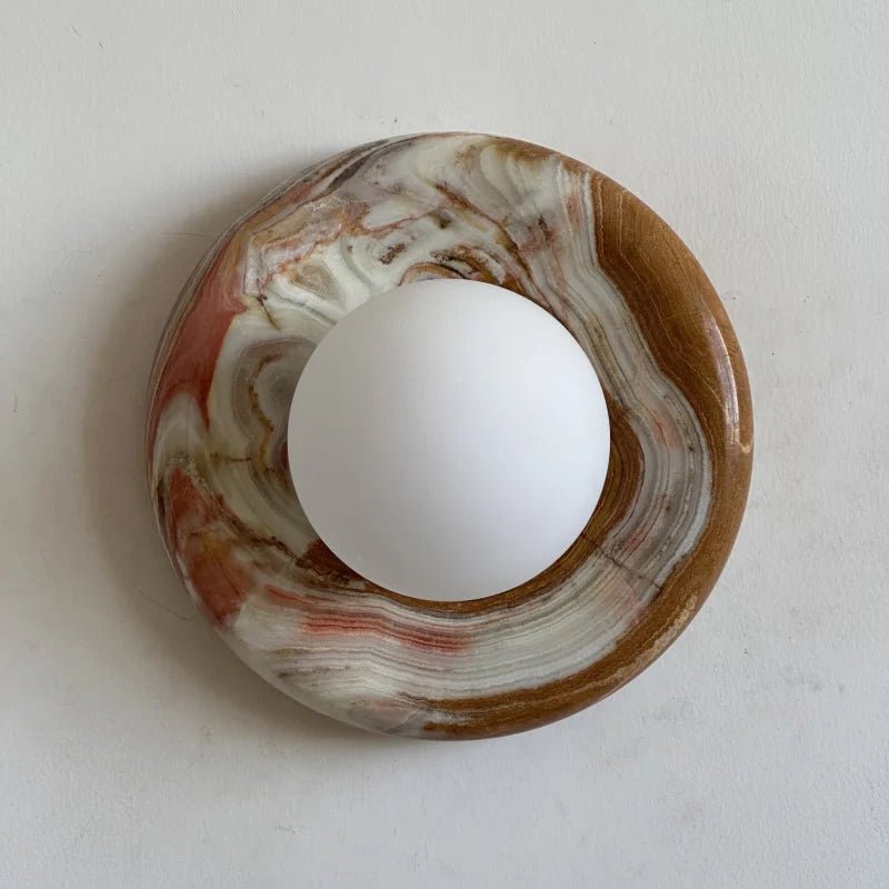 Globe Wall Light featuring a natural onyx backplate, designed as a compact ambient sconce for modern interior decor. 7