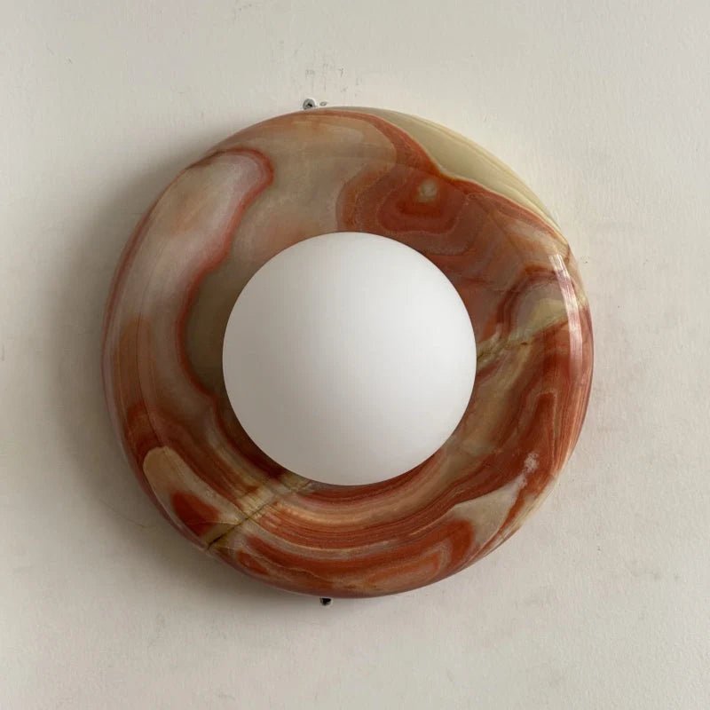Globe Wall Light featuring a natural onyx backplate, designed as a compact ambient sconce for modern interior decor. 13