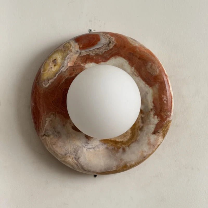 Globe Wall Light featuring a natural onyx backplate, designed as a compact ambient sconce for modern interior decor. 27