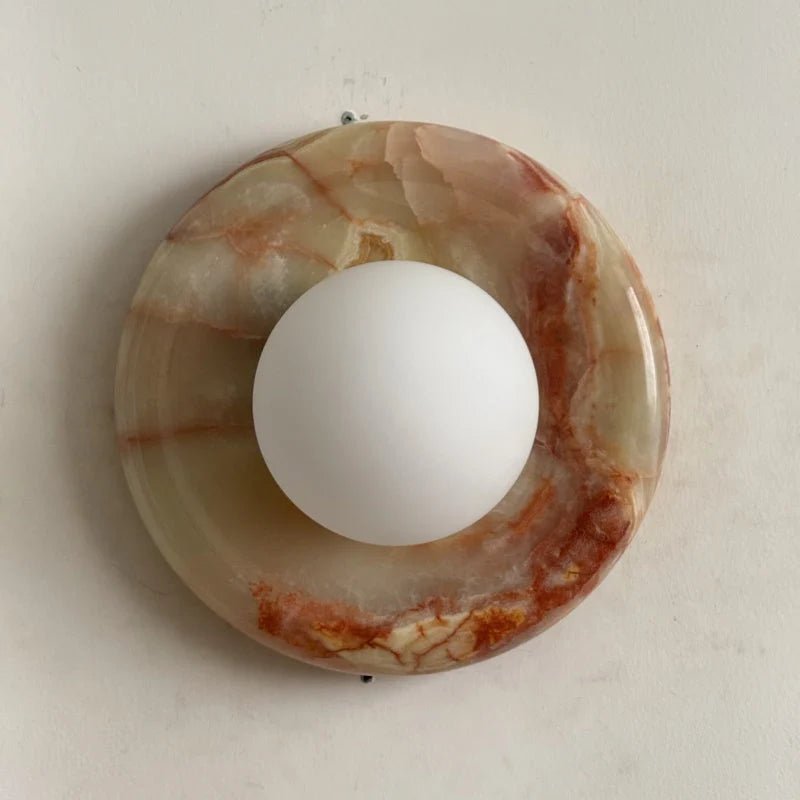 Globe Wall Light featuring a natural onyx backplate, designed as a compact ambient sconce for modern interior decor. 9