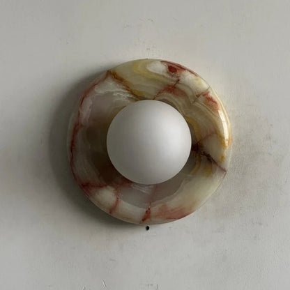 Globe Wall Light featuring a natural onyx backplate, designed as a compact ambient sconce for modern interior decor. 23