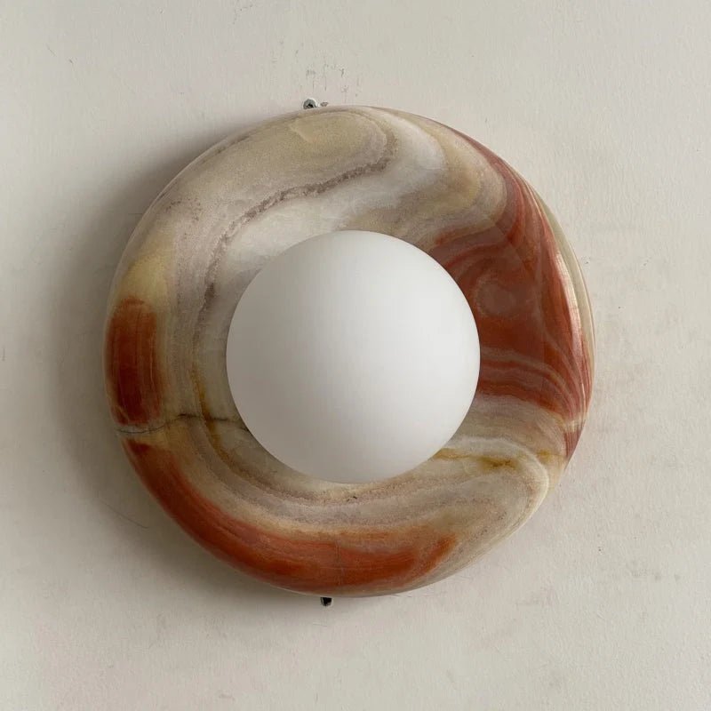 Globe Wall Light featuring a natural onyx backplate, designed as a compact ambient sconce for modern interior decor. 22