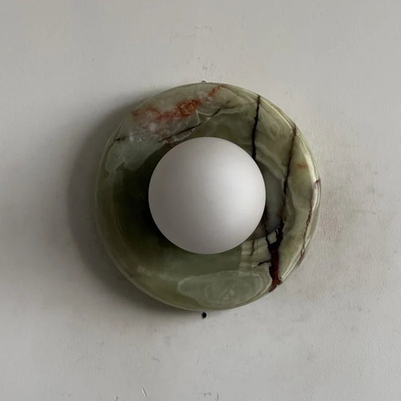 Globe Wall Light featuring a natural onyx backplate, designed as a compact ambient sconce for modern interior decor. 28