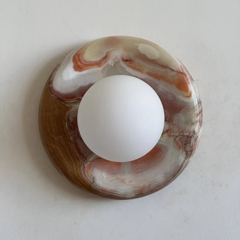 Globe Wall Light featuring a natural onyx backplate, designed as a compact ambient sconce for modern interior decor. 8