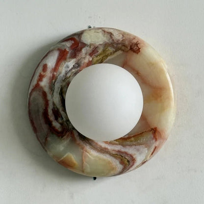 Globe Wall Light featuring a natural onyx backplate, designed as a compact ambient sconce for modern interior decor. 25