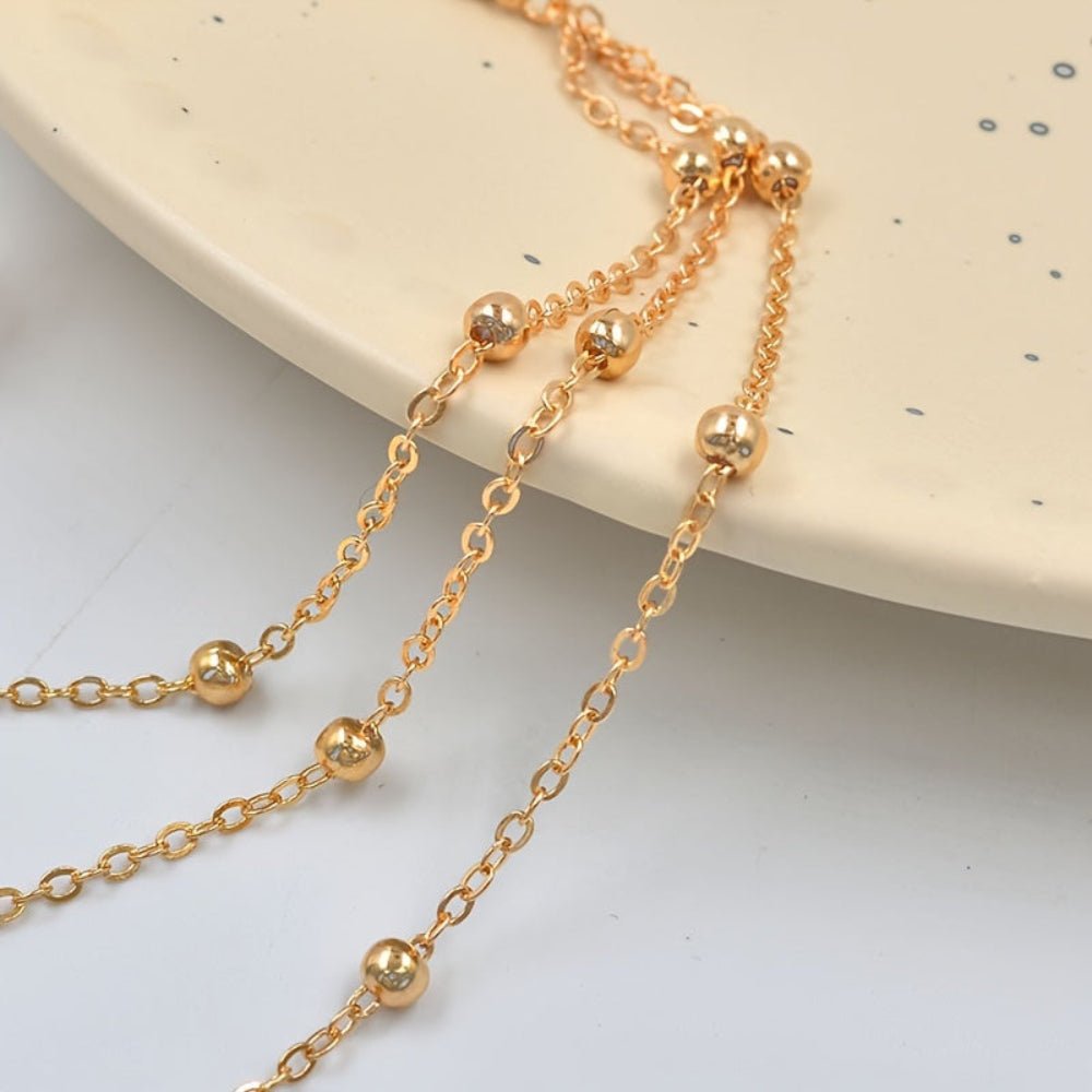 Gold anklet featuring an elegant chain design, perfect for women seeking barefoot foot jewelry for parties and weddings. 2
