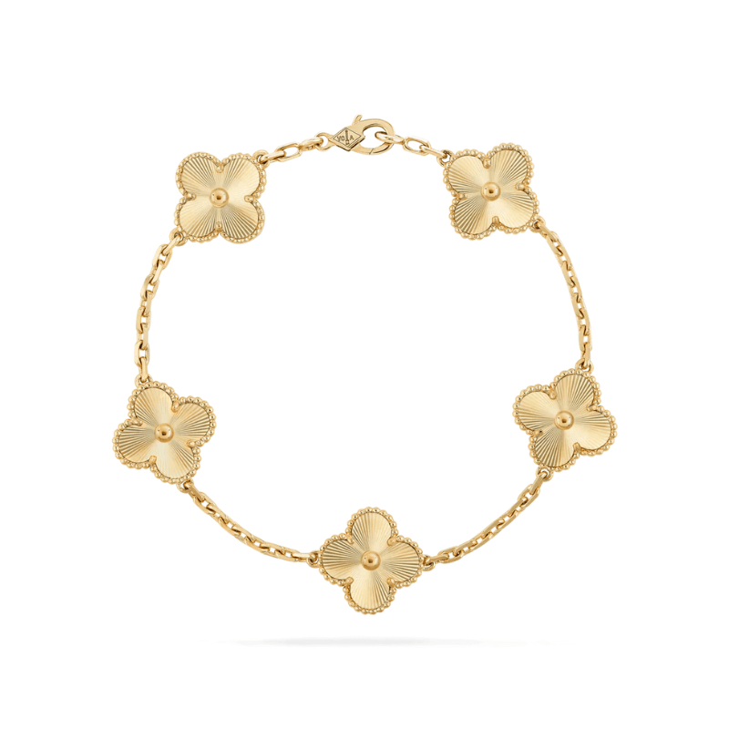 Elegant gold bracelet with adjustable length, featuring stylish black accents, crafted from durable gold-colored metal. 1