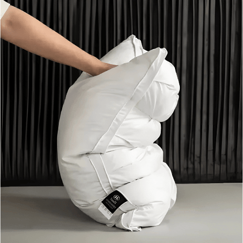 Goose down pillow designed for neck pain relief, featuring hypoallergenic support, breathable comfort, and a soft, adaptable design. 1