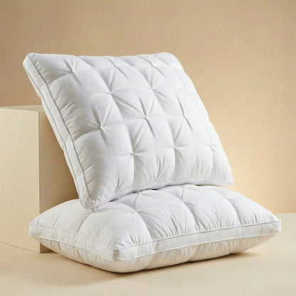 Goose down pillow with breathable cotton cover, designed for all sleep positions, offering soft support and machine washable convenience. 5