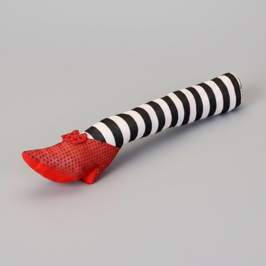 Halloween door stopper featuring whimsical witch legs with a striped design, perfect for festive indoor and outdoor decor. 2