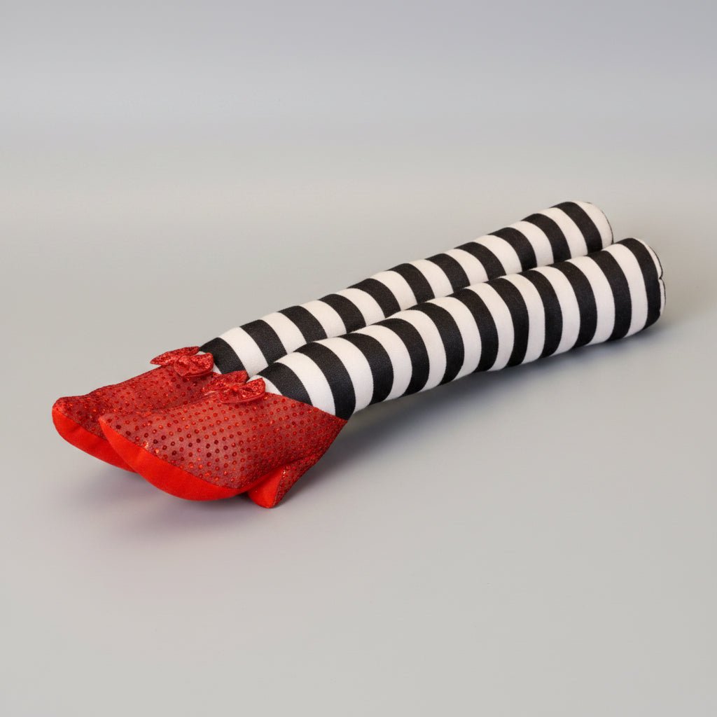 Halloween door stopper featuring whimsical witch legs with a striped design, perfect for festive indoor and outdoor decor. 5