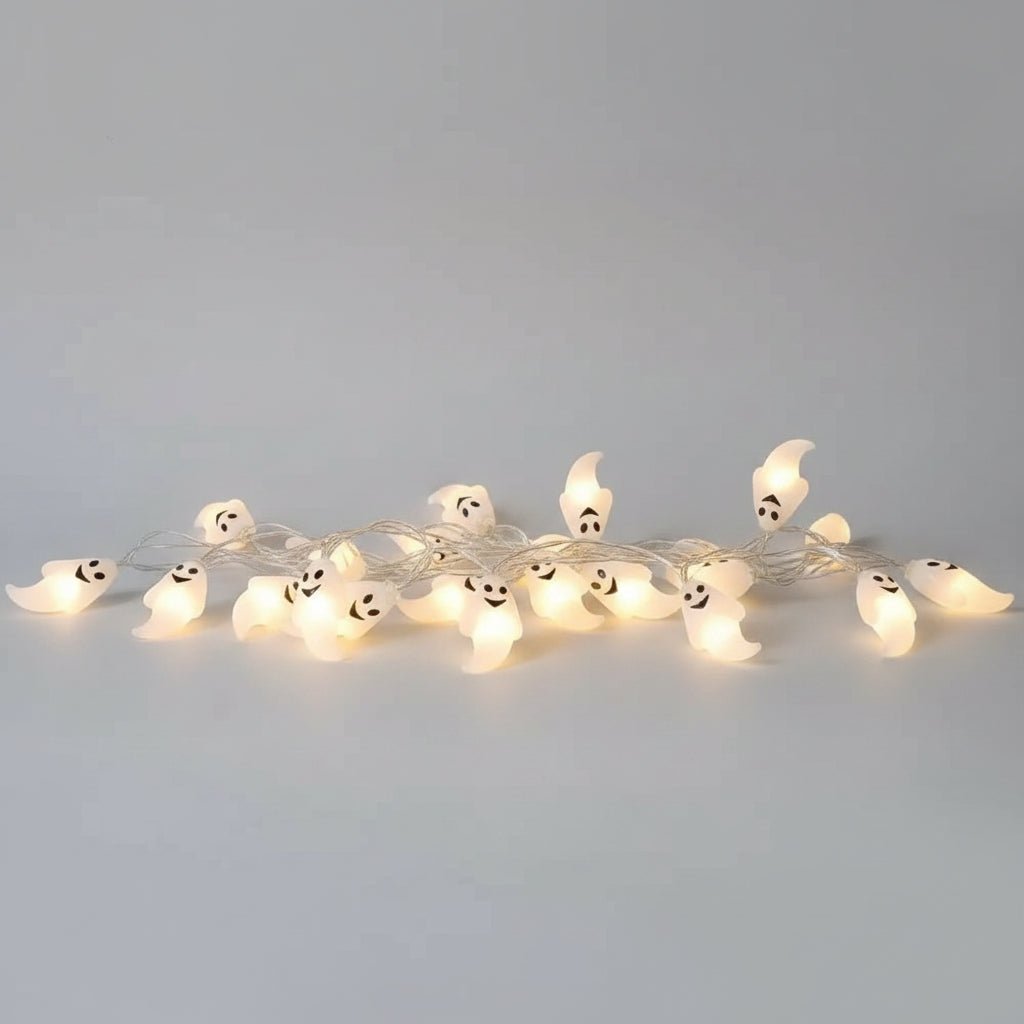 Battery powered Halloween string lights featuring a ghost design, available in warm white or white, measuring 150cm in length. 0