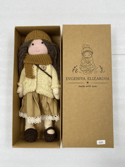 Handmade Waldorf doll featuring soft fabrics and colorful knitted clothing, measuring 28cm, designed for durability and easy cleaning, perfect for kids. 4