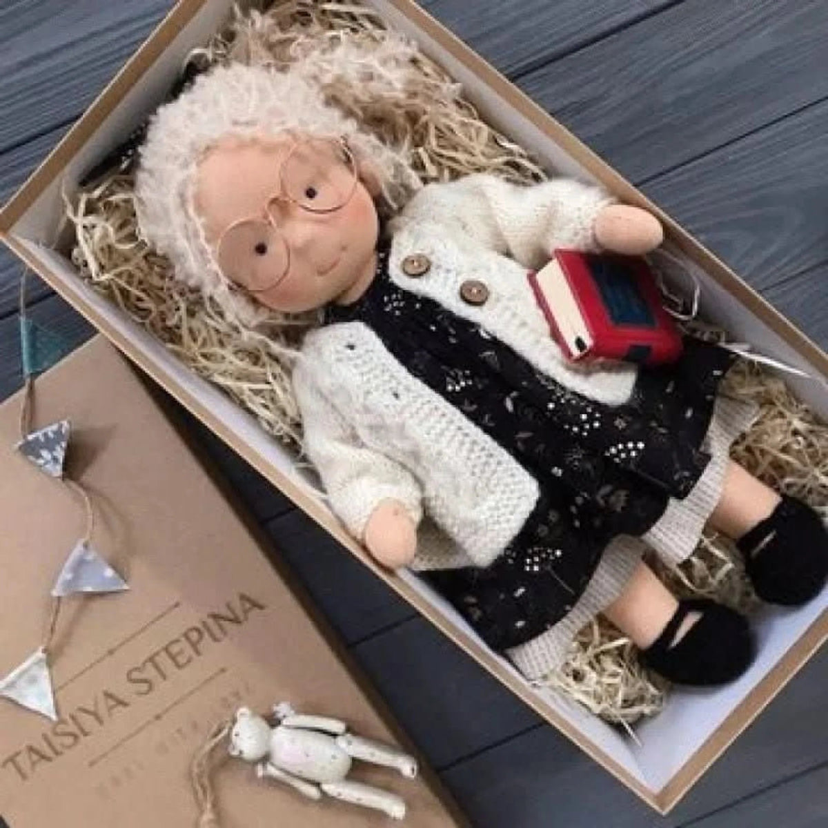 Handmade Waldorf-style doll featuring a soft cotton body and gentle design, perfect for imaginative play and nurturing creativity in children. 11