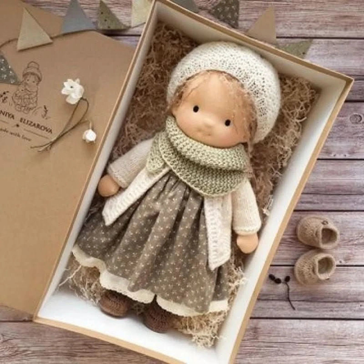 Handmade Waldorf-style doll featuring a soft cotton body and gentle design, perfect for imaginative play and nurturing creativity in children. 7