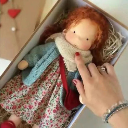 Handmade Waldorf-style doll featuring a soft cotton body and gentle design, perfect for imaginative play and nurturing creativity in children. 33