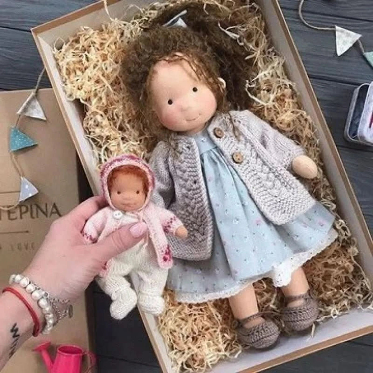 Handmade Waldorf-style doll featuring a soft cotton body and gentle design, perfect for imaginative play and nurturing creativity in children. 29