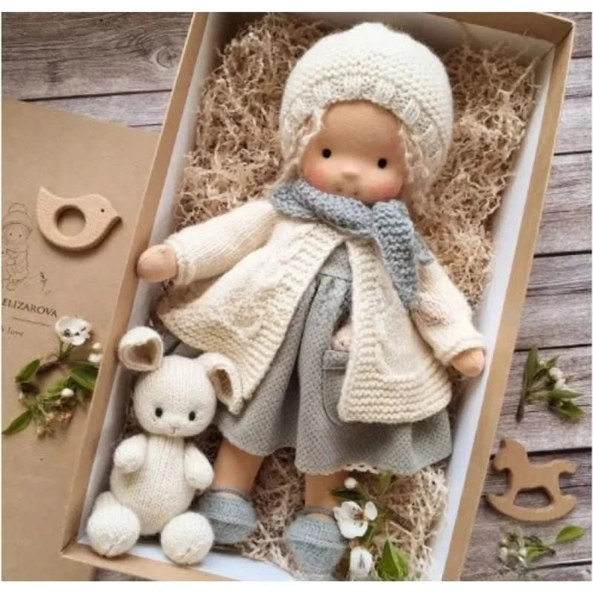 Handmade Waldorf-style doll featuring a soft cotton body and gentle design, perfect for imaginative play and nurturing creativity in children. 13