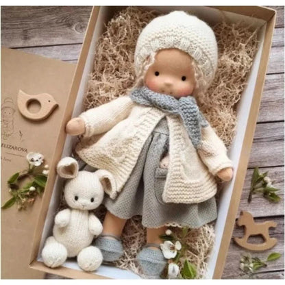 Handmade Waldorf-style doll featuring a soft cotton body and gentle design, perfect for imaginative play and nurturing creativity in children. 13