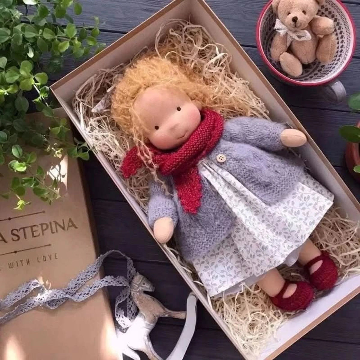 Handmade Waldorf-style doll featuring a soft cotton body and gentle design, perfect for imaginative play and nurturing creativity in children. 3