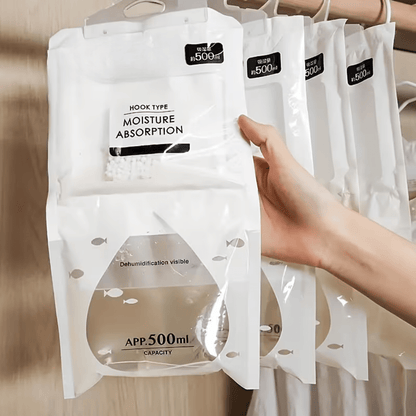 Hanging dehumidifier bags for moisture control, 5-pack, featuring an easy hanging design and no electricity needed for effective dampness absorption. 1