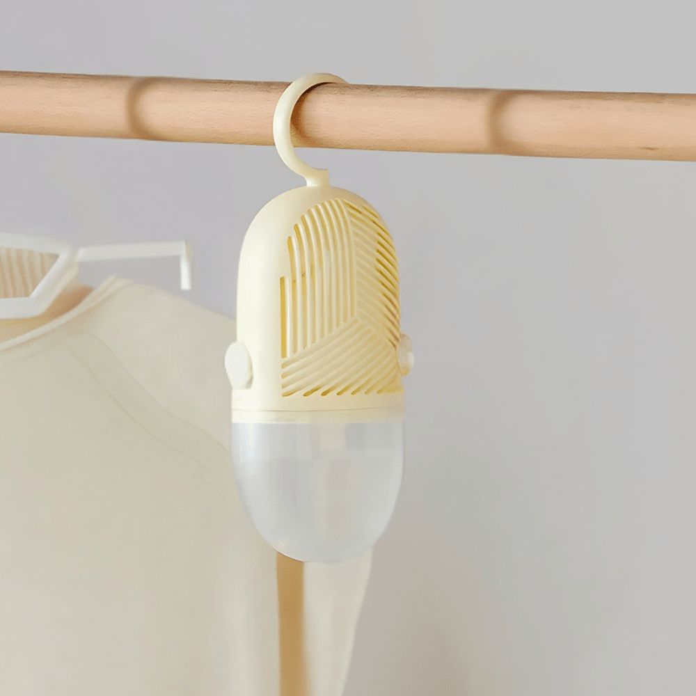 Hanging dehumidifier with reusable moisture absorber for closet, available in green, white, and yellow, designed for space-saving wardrobe organization. 2