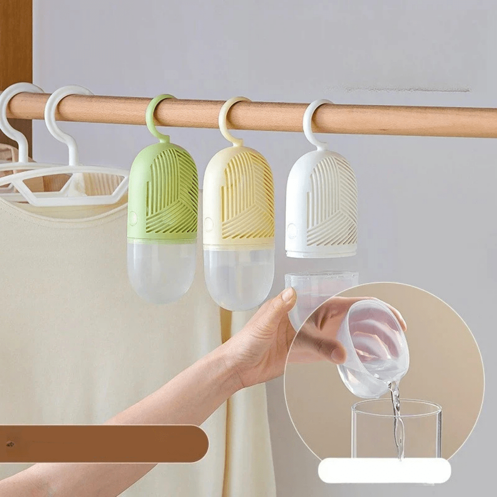 Hanging dehumidifier with reusable moisture absorber for closet, available in green, white, and yellow, designed for space-saving wardrobe organization. 5
