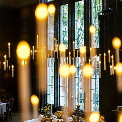 Hanging flameless candle with remote control, emitting warm white LED light, perfect for indoor and outdoor decor. 8
