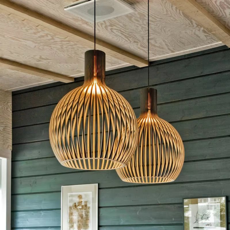 Hanging lamp with adjustable ceiling mount featuring an organic wooden design, perfect for adding a cozy ambiance to dining rooms. 4