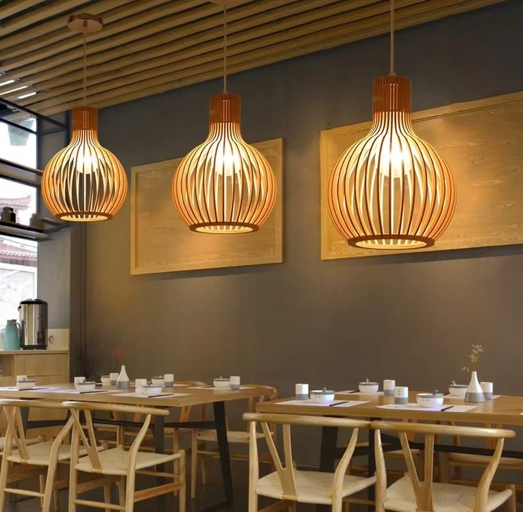 Hanging lamp with adjustable ceiling mount featuring an organic wooden design, perfect for adding a cozy ambiance to dining rooms. 2