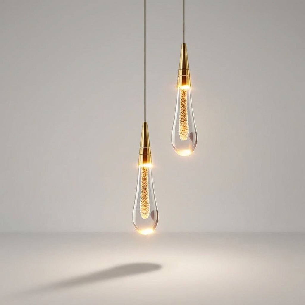 Modern kitchen pendant light featuring a stylish hanging lamp with a drop glass design, emitting warm white ambient lighting for a cozy atmosphere. 2