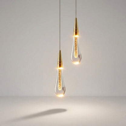 Modern kitchen pendant light featuring a stylish hanging lamp with a drop glass design, emitting warm white ambient lighting for a cozy atmosphere. 2