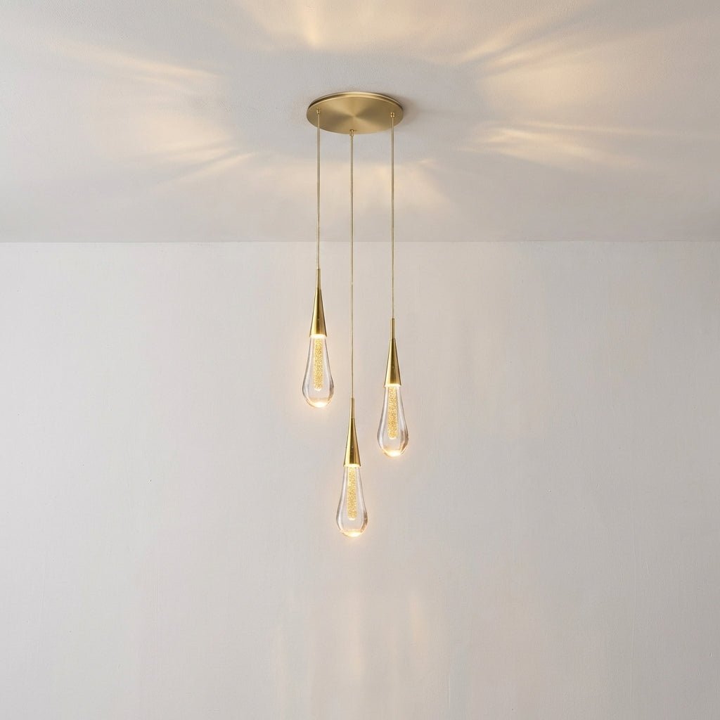 Modern kitchen pendant light featuring a stylish hanging lamp with a drop glass design, emitting warm white ambient lighting for a cozy atmosphere. 4