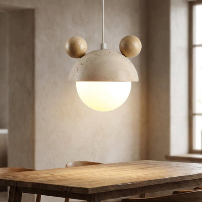 Hanging lamp featuring a warm LED light and a natural travertine finish, showcasing a playful minimalist design perfect for modern interiors. 1
