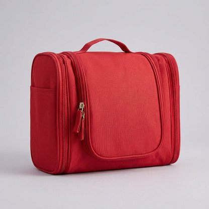 Hanging toiletry bag for travel featuring water-resistant lining, smart compartment division, and a foldable design for easy organization. 0