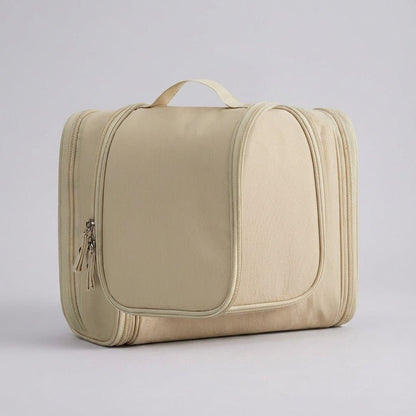 Hanging toiletry bag for travel featuring water-resistant lining, smart compartment division, and a foldable design for easy organization. 7