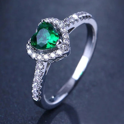 Heart-shaped diamond engagement ring crafted from 925 silver, symbolizing classic love, available in sizes 5-9. 2