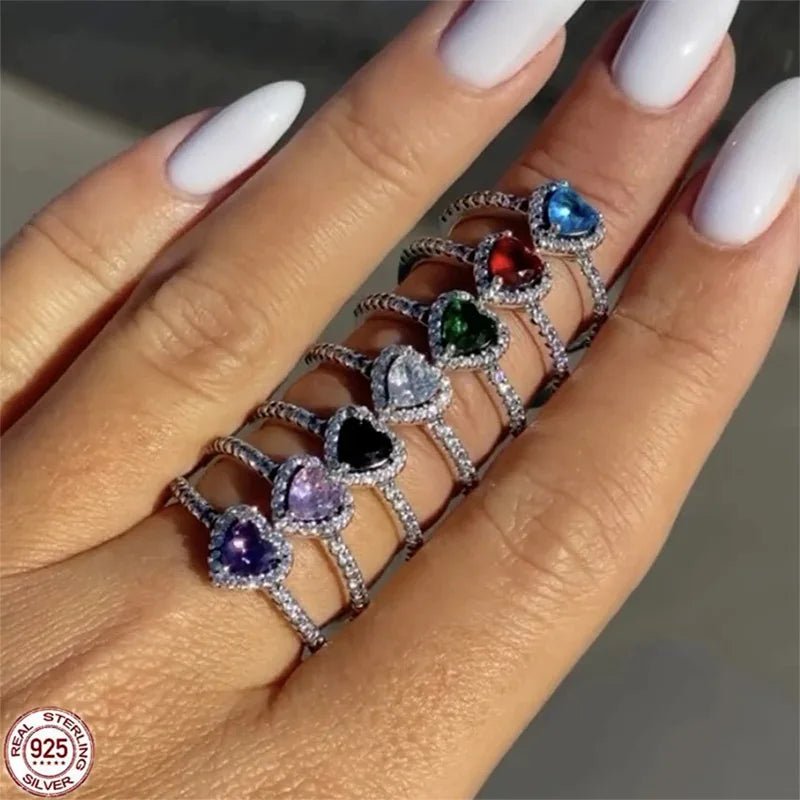 Heart-shaped diamond engagement ring crafted from 925 silver, symbolizing classic love, available in sizes 5-9. 1