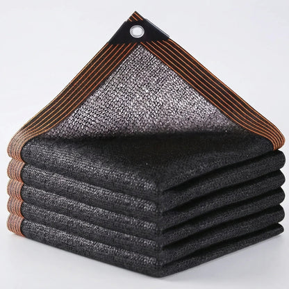 Heavy duty outdoor shade mesh with reinforced edges, designed for pergolas and patios, featuring a breathable black cover for optimal sun protection and ventilation. 0