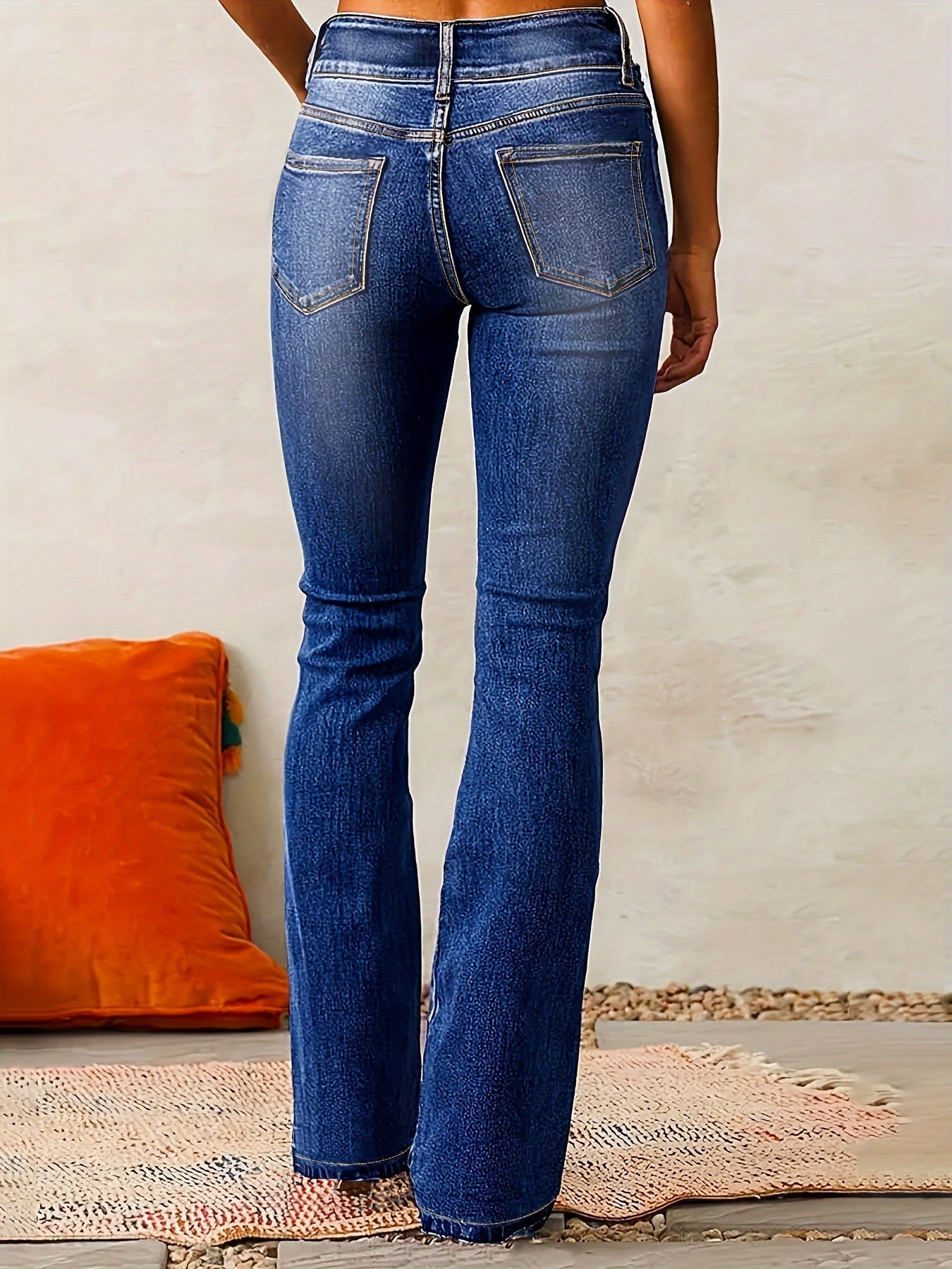 High waisted bootcut denim jeans featuring a double-button waistband and a sculpting stretch fit, designed in classic denim blue for a flattering silhouette. 3
