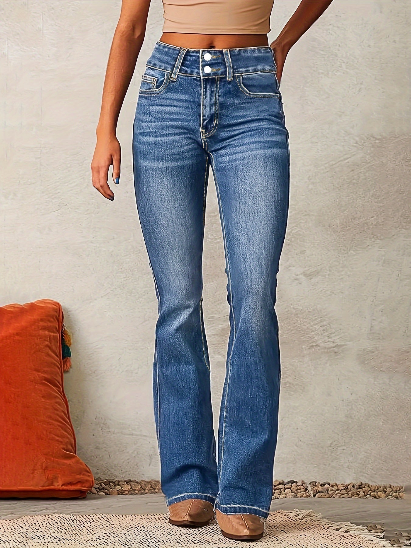 High waisted bootcut denim jeans featuring a double-button waistband and a sculpting stretch fit, designed in classic denim blue for a flattering silhouette. 0