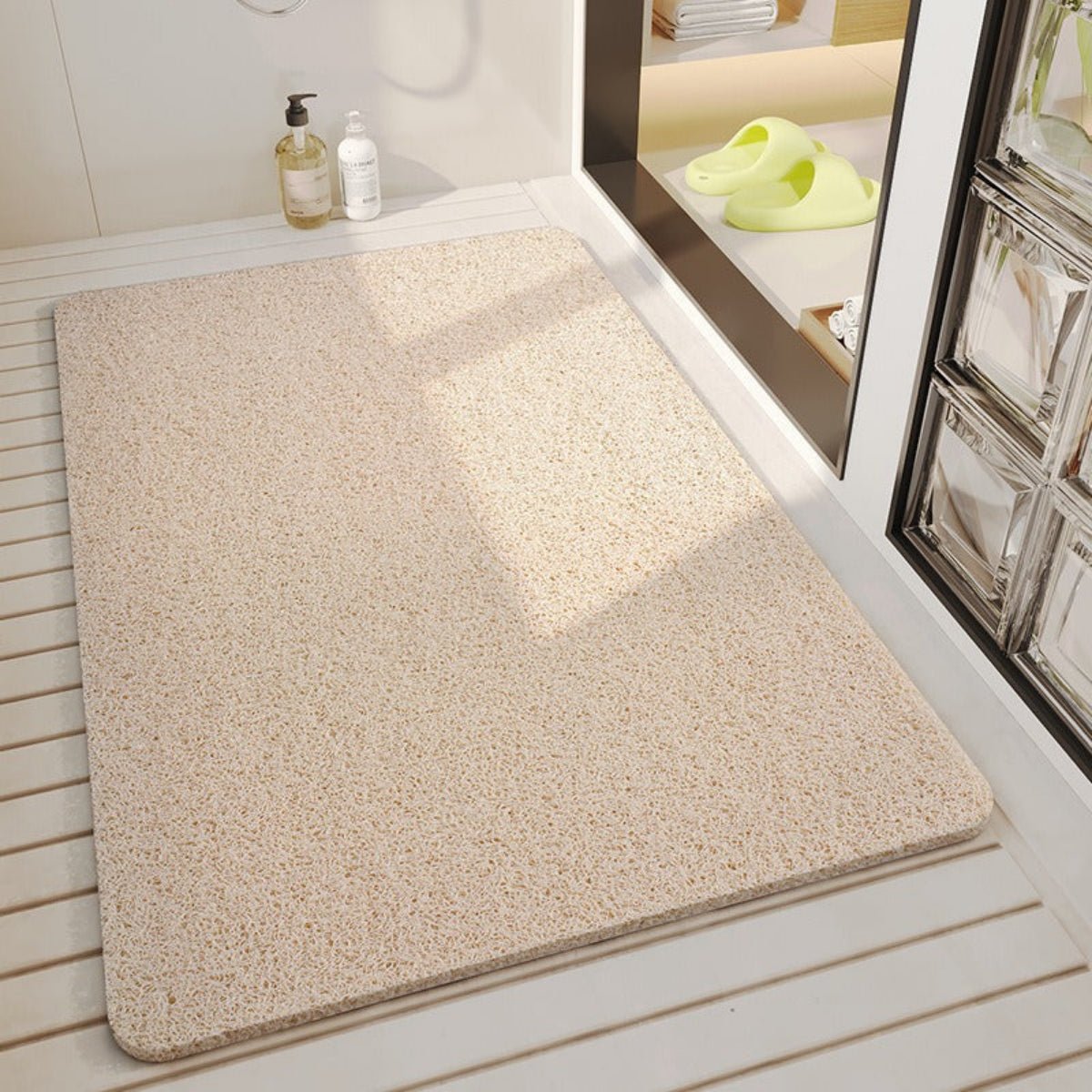 Hollow anti-slip bathroom mat featuring a quick-drying open-grid design, ideal for showers and wet areas, ensuring safety and comfort. 0