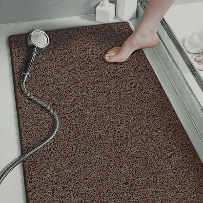 Hollow anti-slip bathroom mat featuring a quick-drying open-grid design, ideal for showers and wet areas, ensuring safety and comfort. 4
