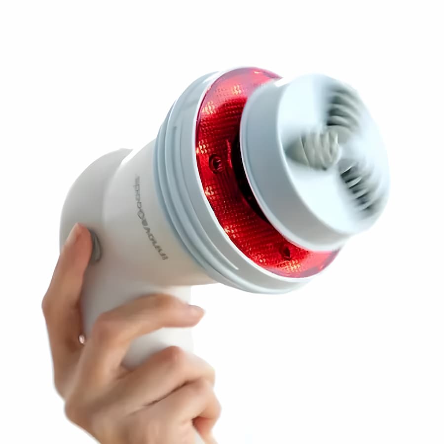 Home cellulite reduction device featuring infrared heat and vibrating massage technology for non-invasive skin smoothing and toning. 6