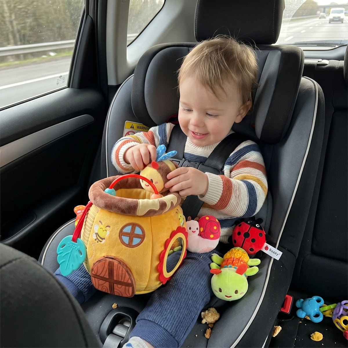 Honey Pot Plush Activity Set featuring interactive sensory elements, designed for toddlers to enhance fine motor skills with soft, cuddly textures and engaging features. 1