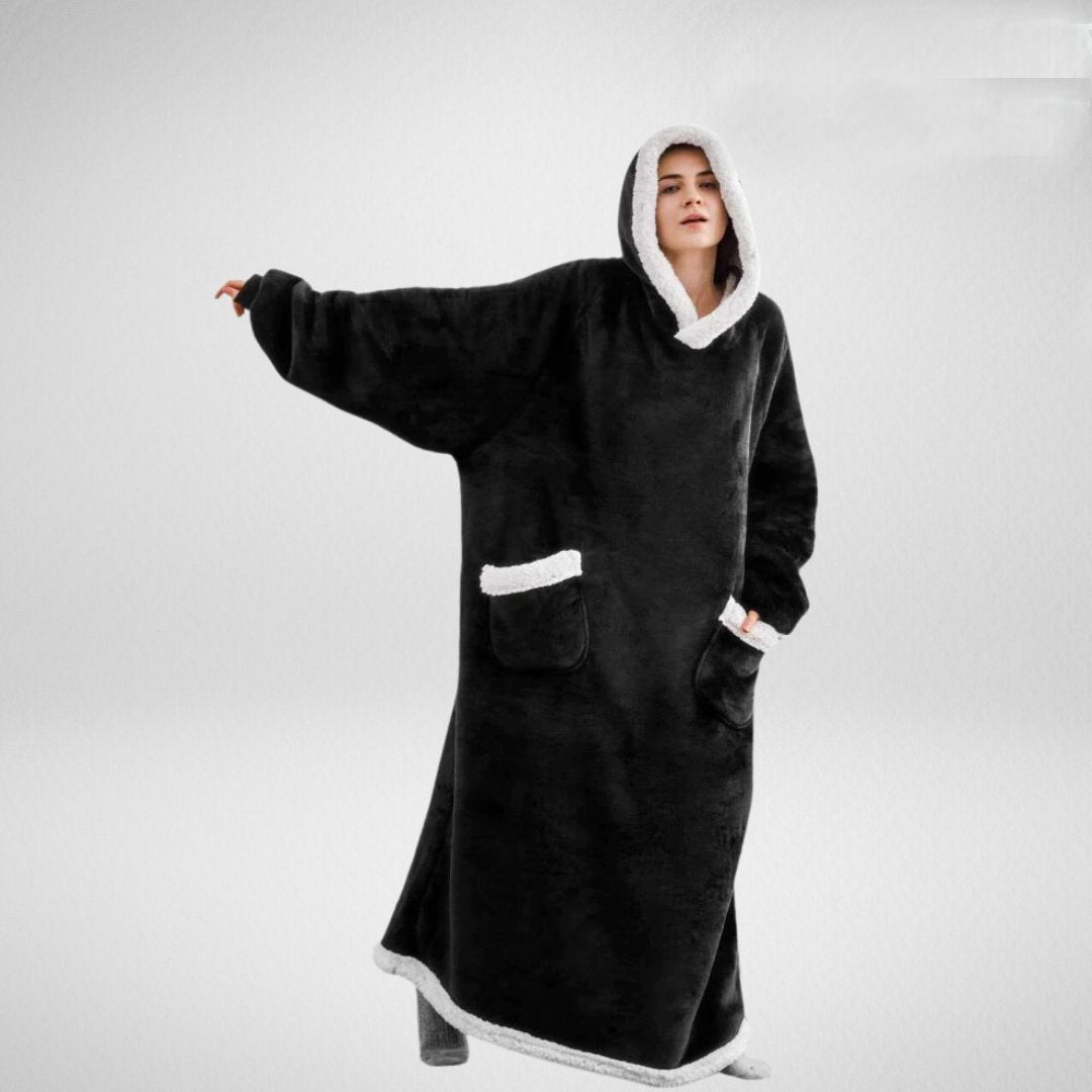 Oversized hooded blanket hoodie with soft Sherpa lining, perfect for cozy comfort at home or outdoor activities. 2